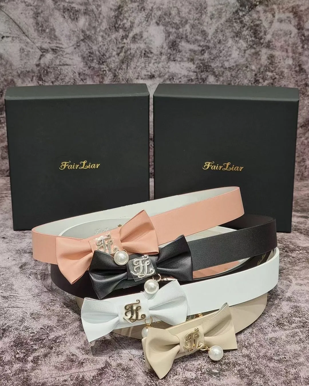 

Hot selling golf ladies clothing belt accessories fashion ladies bow pearl belt distribution box ladies belt