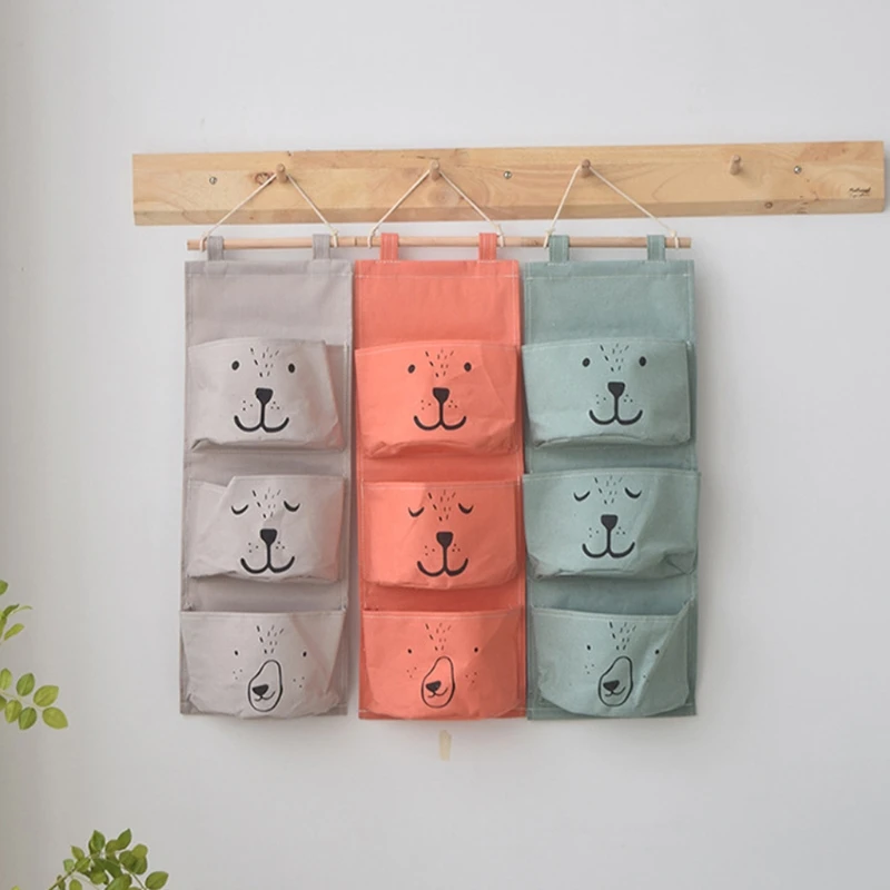 

Multi Storey Linen Hanging Bag Waterproof 3 Pockets Cartoon Face Storage Bag LX9C