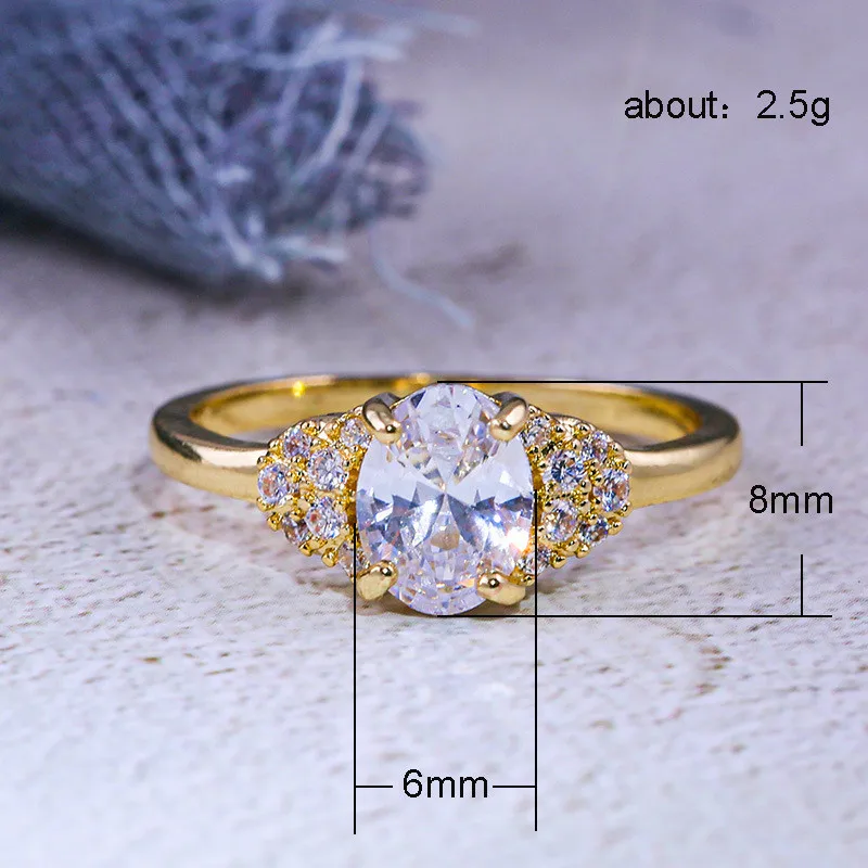 Роскошное женское кольцо с овальным цирконом модное обручальное желтого и