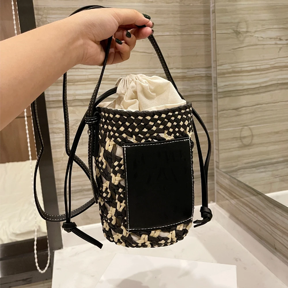

Casual Hollow Straw Bucket Bag Designer Brands Striped Woven Shoulder Crossbody Bags Summer Beach Small Tote Female Purses 2021