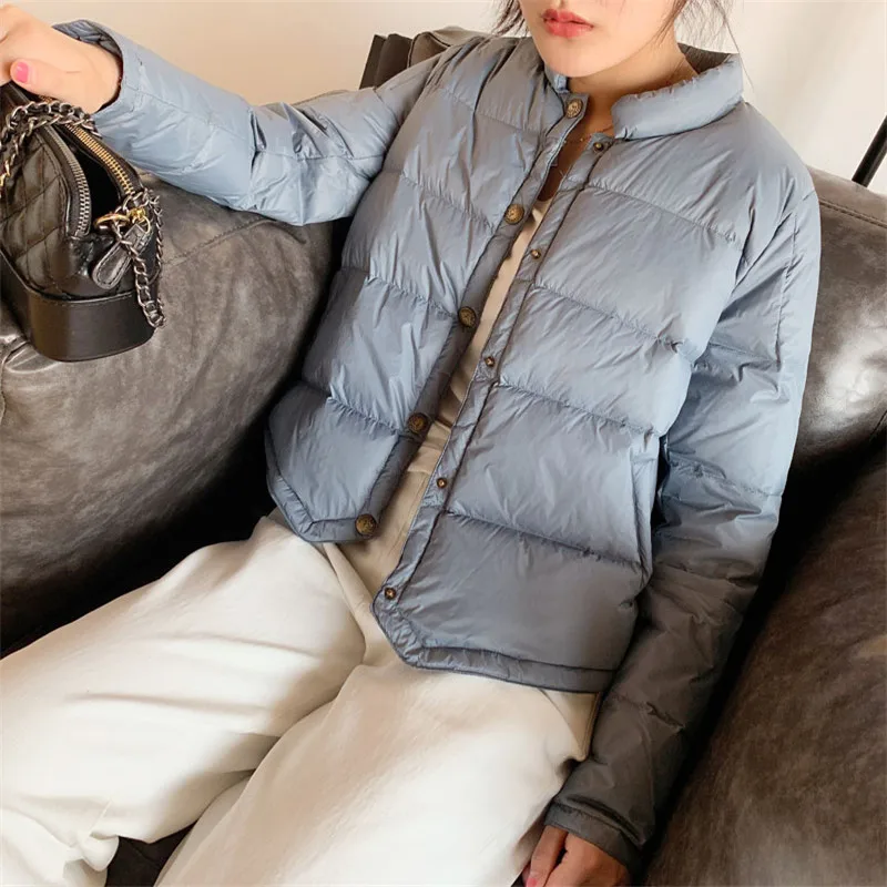 Женский короткий пуховик на утином пуху теплый тонкий осень и зиму светильник
