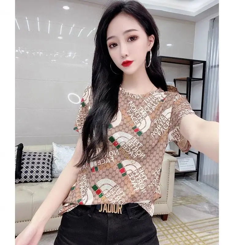 

Europe station 2021 summer new short sleeve printed T-shirt women's age reduction fashion foreign style slim trend top