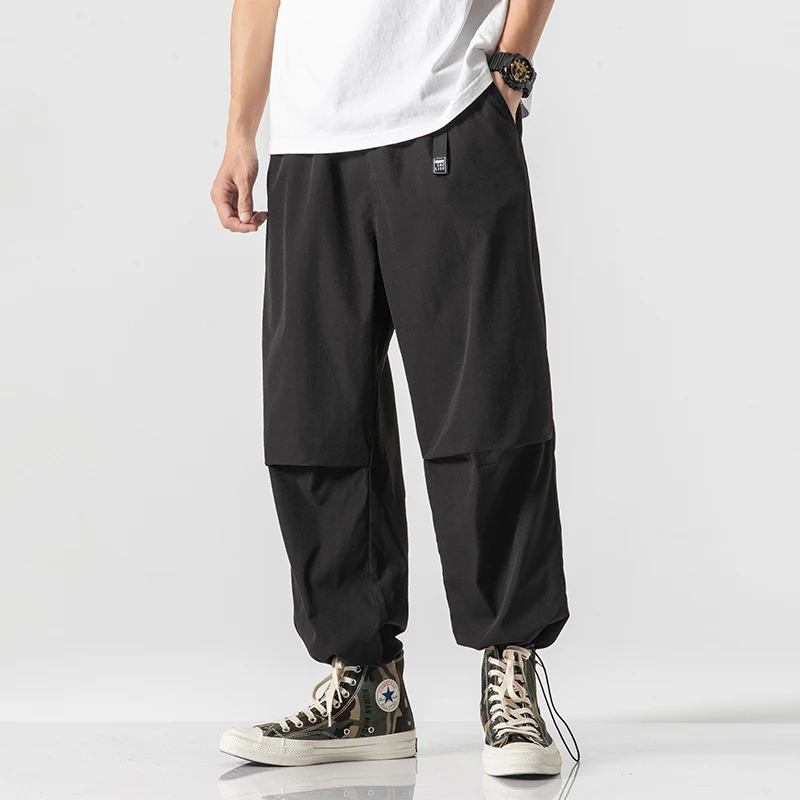 

Plus Size 5XL Men Loose Wide Leg Pants Long Trousers Fashion Mens Joggers Harem Pants Elastic Waist Baggy Sweatpants
