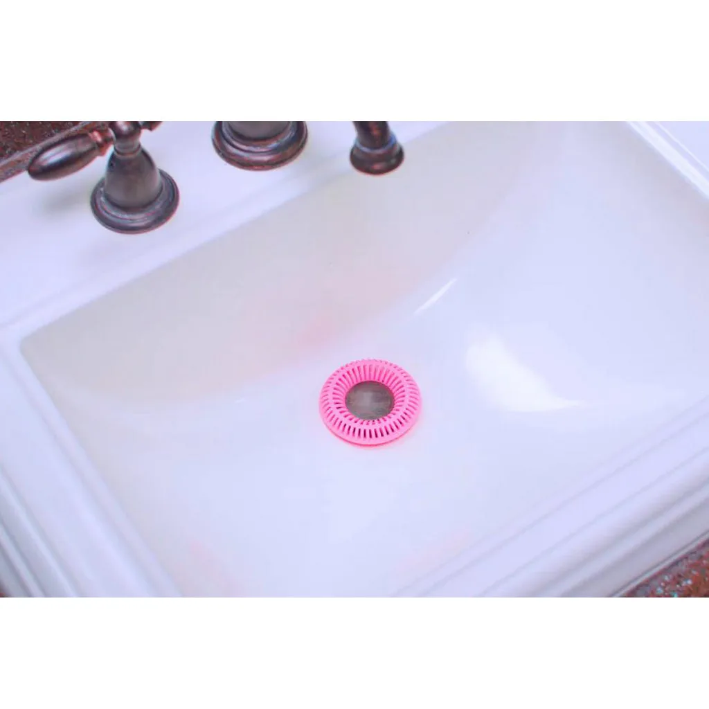 Кольцо с фильтром для волос обертывается вокруг слива чтобы моментально ловить