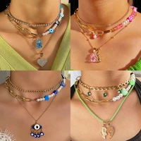 flatfoosie fashion evil eyes beads pearl choker necklace for women multilayer heart bead metal chain necklaces new party jewelry