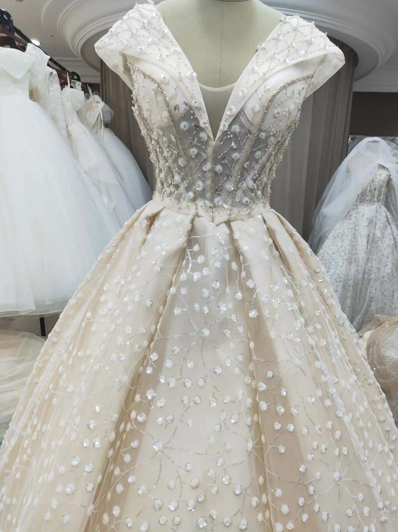 

Champagne Floor Length V-Neck Beading Lace Backless Pleating Sleeveless Ball Gown Wedding Dress