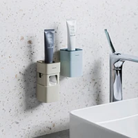 automatic toothpaste squeezer wall mount bracket for toothpaste dustproof rack free punching household bathroom accessories