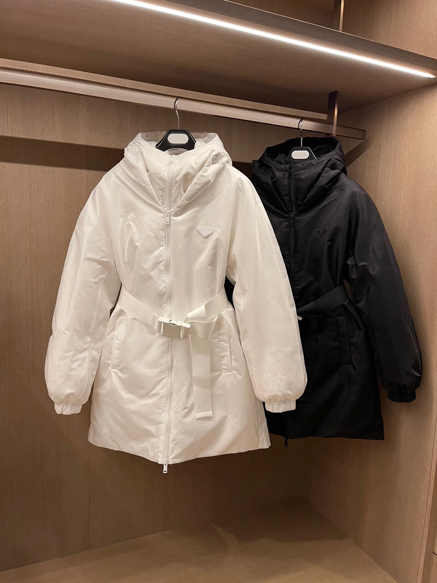 

In winter, the new hooded long down cotton-padded jacket bread clothes with belts keep warm and slim