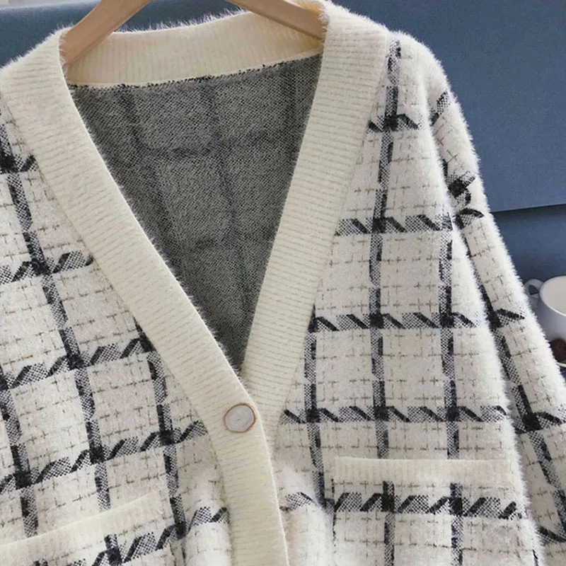 

Golf clothing jacket men's and women's autumn and winter thick knitted sweater Korean version of the slim V-neck warm couple car