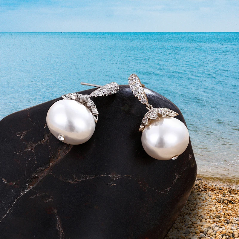 

Hot sale Fashion stainless steel natural pearl earrings Women's pendant ear-rings suitable for wedding party Gifts 2 colors