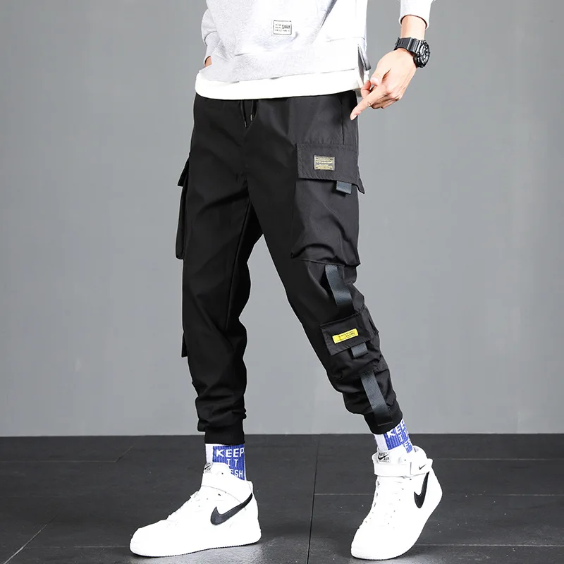 

Calça harem com bolsos e fitas, calça de corrida masculina da moda harajuku, hip hop, casual com bolsos