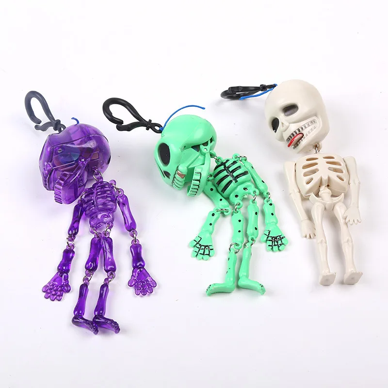 

Halloween Horror Glow-in-the-dark Skeleton Spoof Toy Plastic Scary fluorescent Small Skeleton Key Chain Pull Ghost