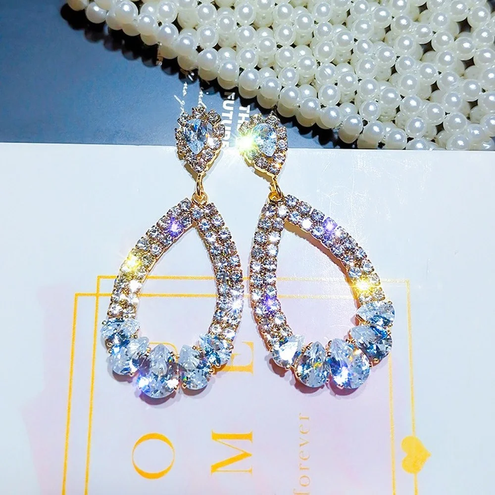 

2021European and American fashion OL women's party alloy full diamond simple personality geometric rhinestone earrings jewelry