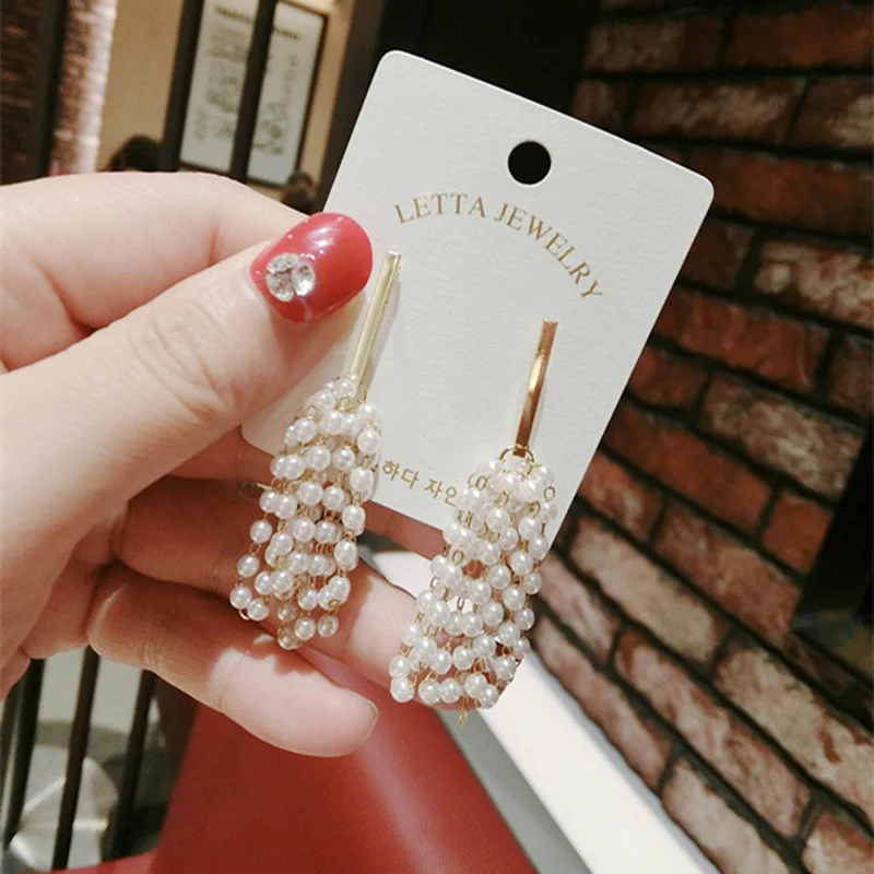 

New Earrings 2021 Tide Simple Female Senior Sense Niche White Earrings Small Earrings Elegant Prevent Allergy