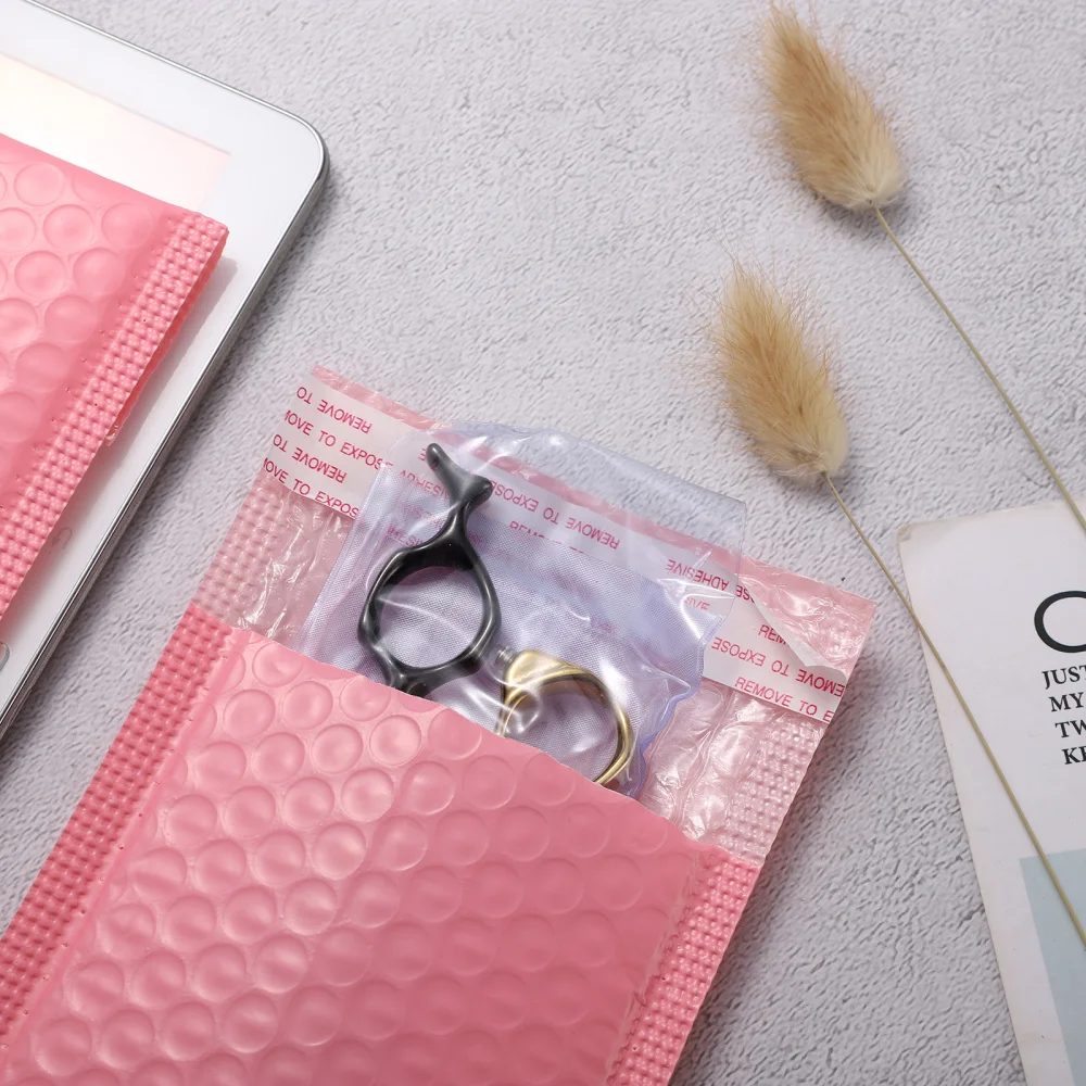 

NUOBESTY 50pcs Shockproof Waterproof Packing Envelope Padded Bubble Envelopes Wrapper Bag Mailers (Pink, 15x11cm)