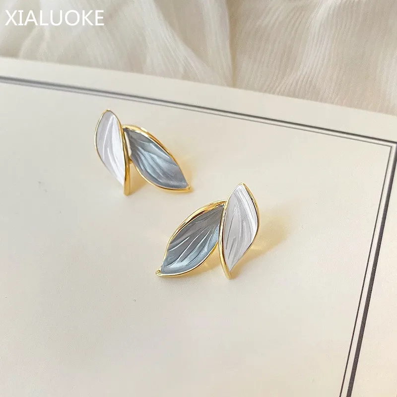 

XIALUOKE S925 Needle New Fashion Contracted Painting Stud Earrings For Women Trendy Asymmetrical Leaf Earring Party Jewelry ER21