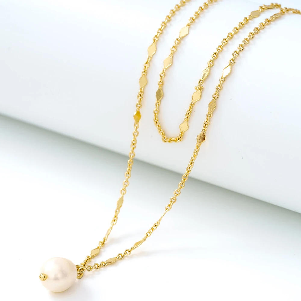 

trendy gold plated multi double virgin mary layer fresh water pearl statement Strand & String chain necklace