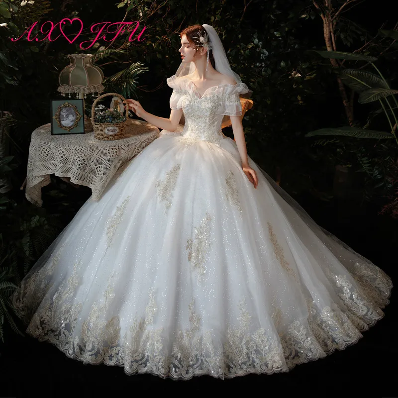 

AXJFU princess champagne flower white lace wedding dress party vintage boat neck beading crystal ruffles sparkly wedding dress