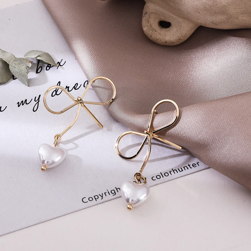 

Korean bowknot love pearl earrings fashion temperament simple lady stud earrings