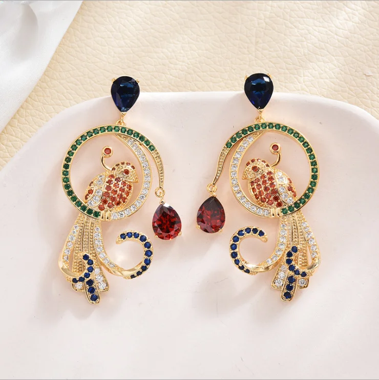 

Women New retro fashion zircon earrings color double bird circle earrings