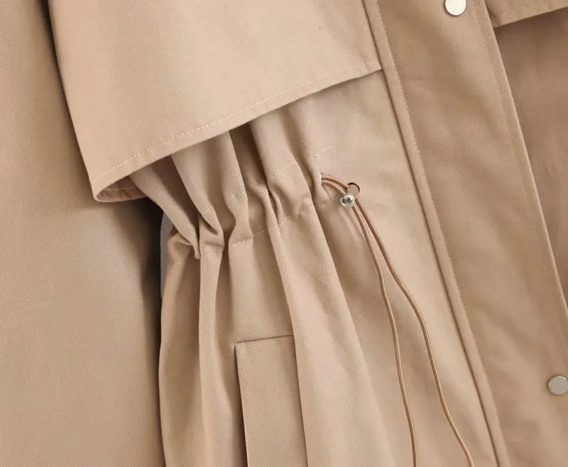 

Autumn new ladies windbreaker long-sleeved pocket stitching decoration drawstring waist hooded trench coat fashion slim coats