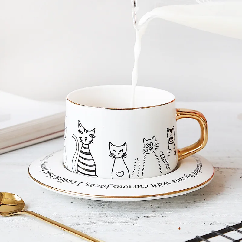 

Cartoon Porcelain Cat Coffee Cup With Saucer Gold Spoon Modern Home Decor White Black Ceramic Tea Cup and Tray Cute Couple Gifts
