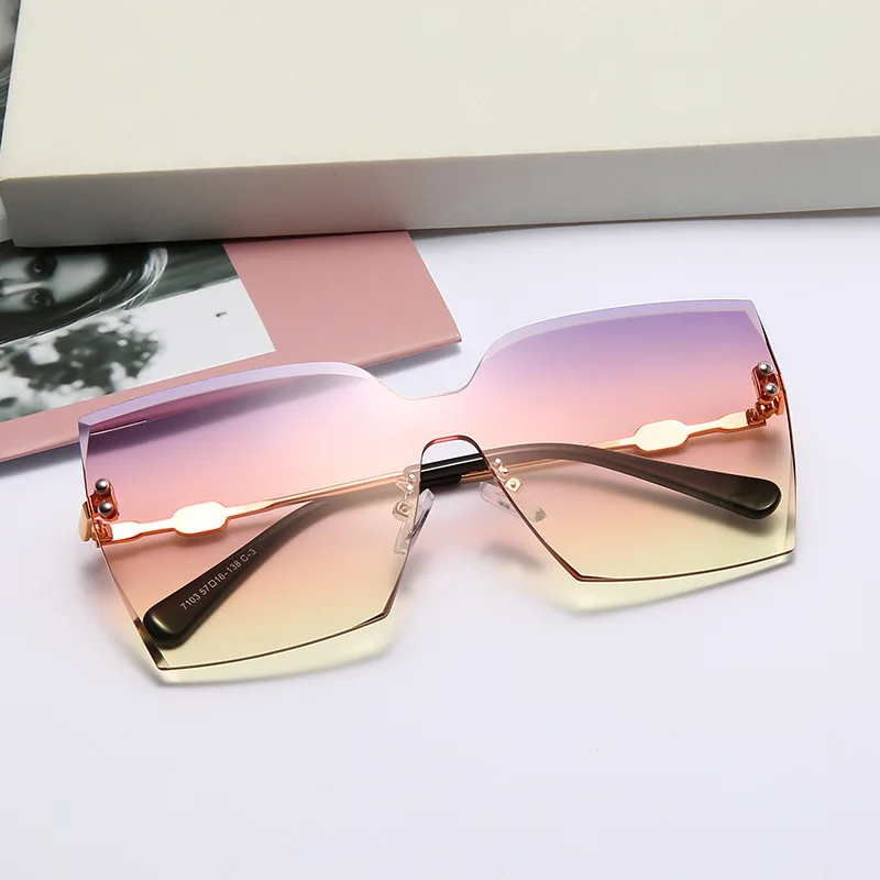 

2021 new cat's Eye Sunglasses men's and women's unise rimless metal gradual change drive sunshade fashion designer brand UV400