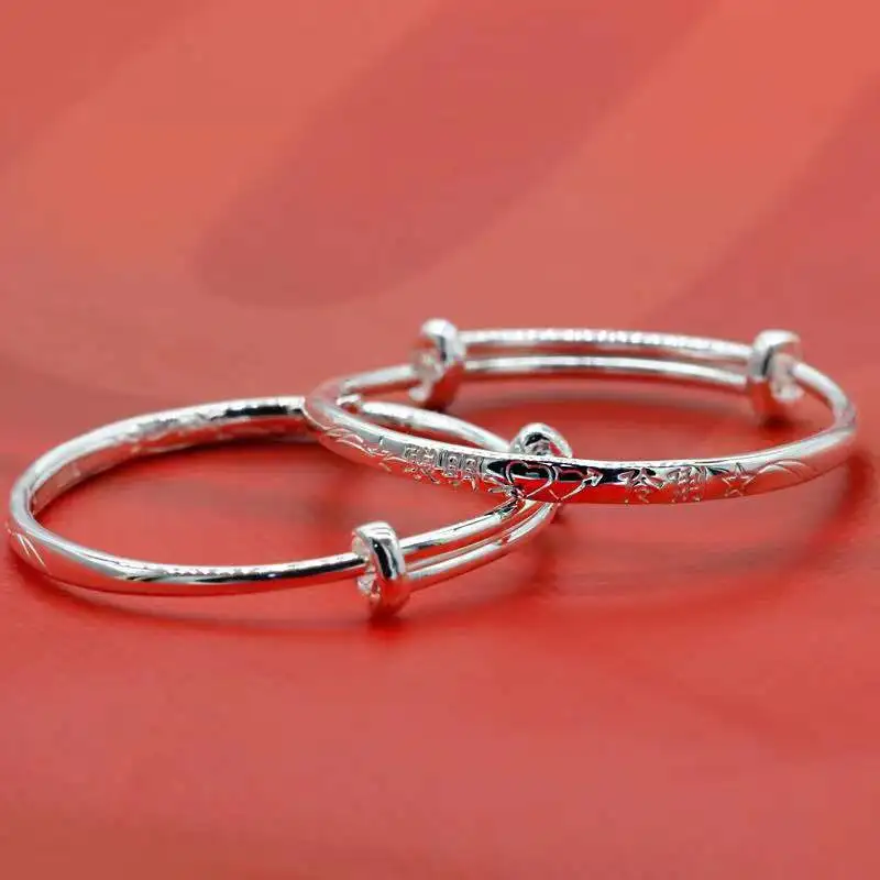 Браслет из серебра 9999 пробы с колокольчиком и надписью Благословение ребенка |