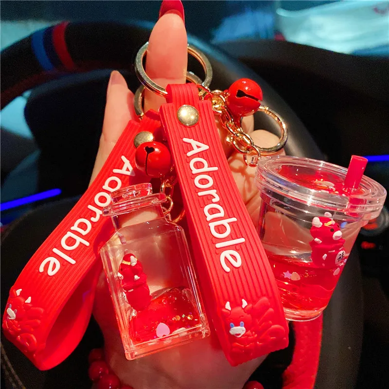 

Red Year of The Ox Bottle Keychain Creative Liquid Quicksand Bottle Auspicious Pendant Couple Bag Car Keychain Charms Jewelry