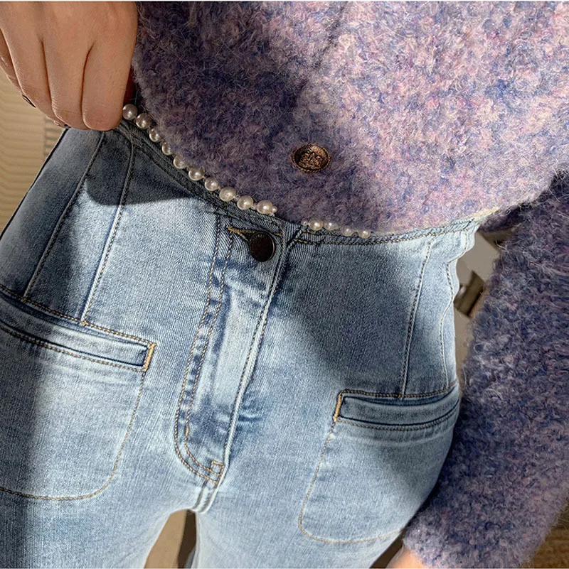 

2021 Women Korean Pearl Waist Blue Jeans Fall and Winter High Waist Slim Body Skinny Jeans Woman Slim Pants Solid Color Trouser