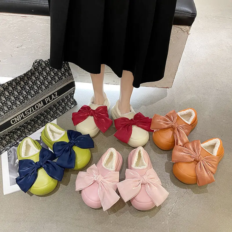 

Женские хлопковые тапочки с большим бантом, на толстой подошве, водонепроницаемые Зимние Теплые Симпатичные плюшевые хлопковые тапочки, ка...