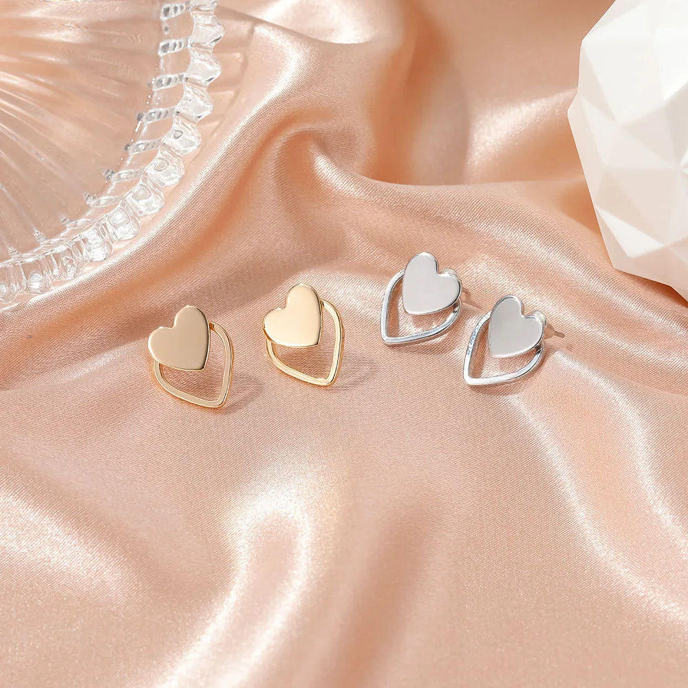 

Modyle New Gold Silver Color Heart Earrings For Women Punk Vintage Hollow Stud Earrings Fashion Jewelry