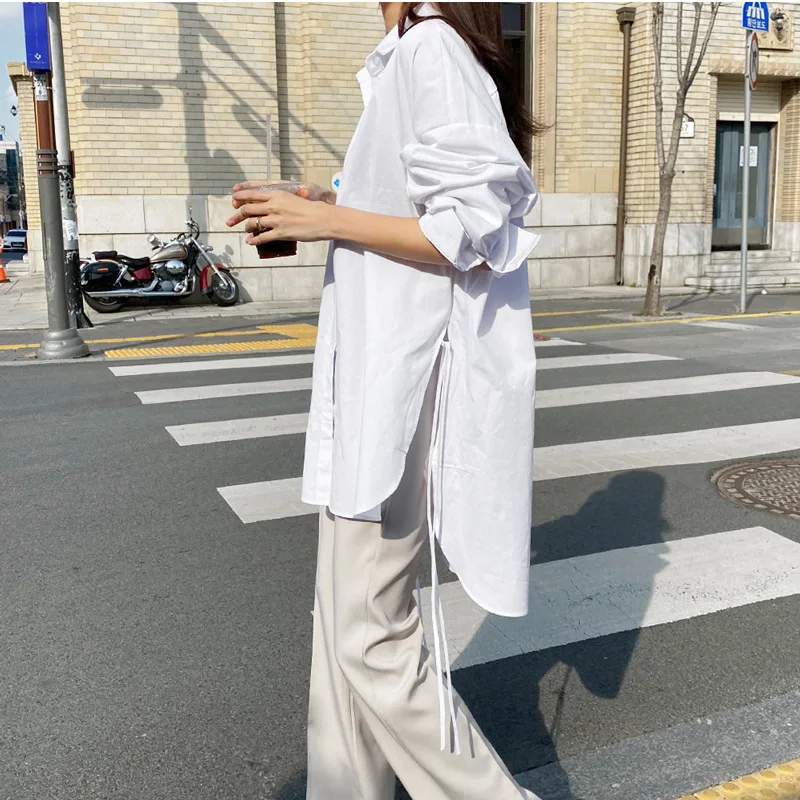 

Stylish Solid Shirts Women's Asymmetrical Blouse 2021 Casual Lace Up Blusas Female Button Lapel Shirt Oversized Tunic 5XL