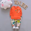 Jesienne zestawy ubrań dla chłopców moda dla dzieci Cartoon dinozaur z długim rękawem T-shirt + płaszcz + spodnie 3 sztuk Jogging suiry dla niemowląt chłopiec dres