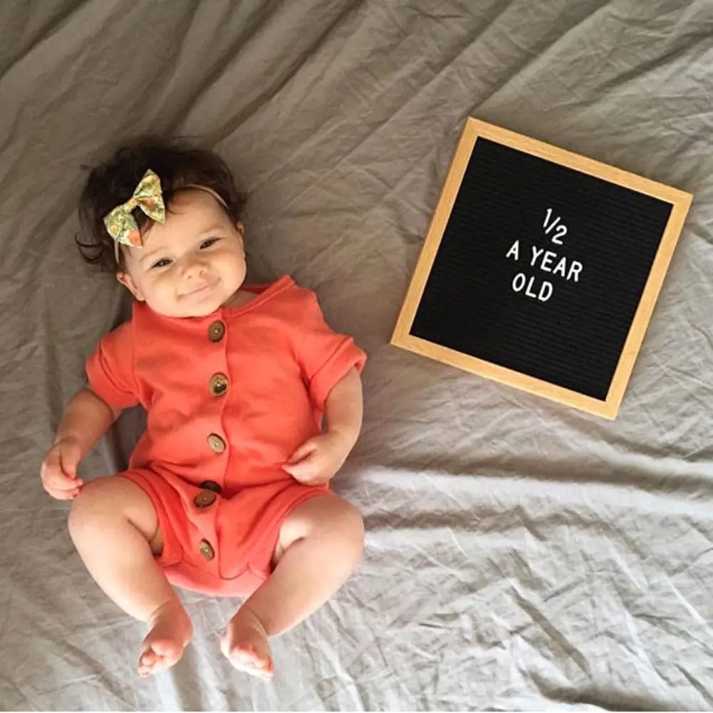 Комбинезон ярких цветов с пуговицами и открытой строчкой для детей от 6 до 24