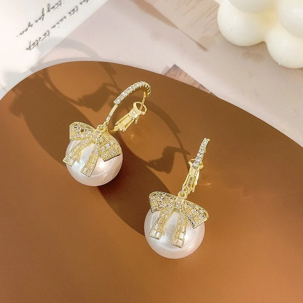 

Fashion high-end pearl earrings new trendy atmosphere zircon bowknot retro circle earrings ladies ear jewelry