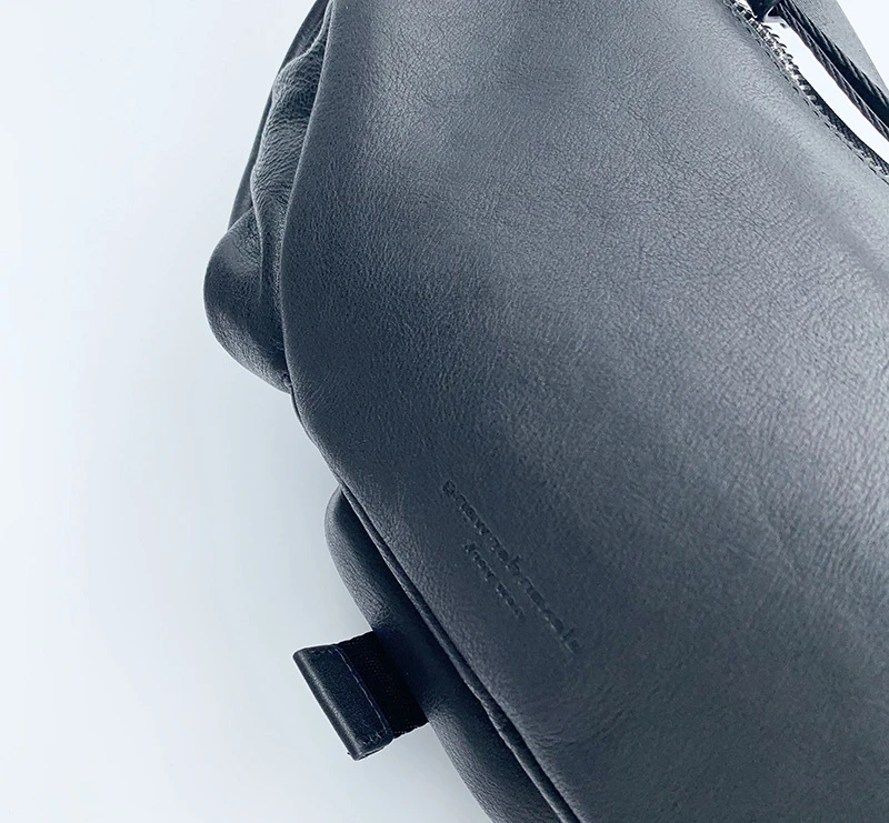 

Quality Luxury Designer Brand Fashion Classic Letter Chest Bag Straddle One Shoulder Waist Pack Cowhide Camera Bag Unisex A2