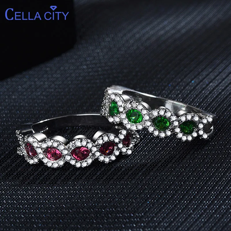 Женское серебряное кольцо с драгоценными камнями волнистое рубином и изумрудом