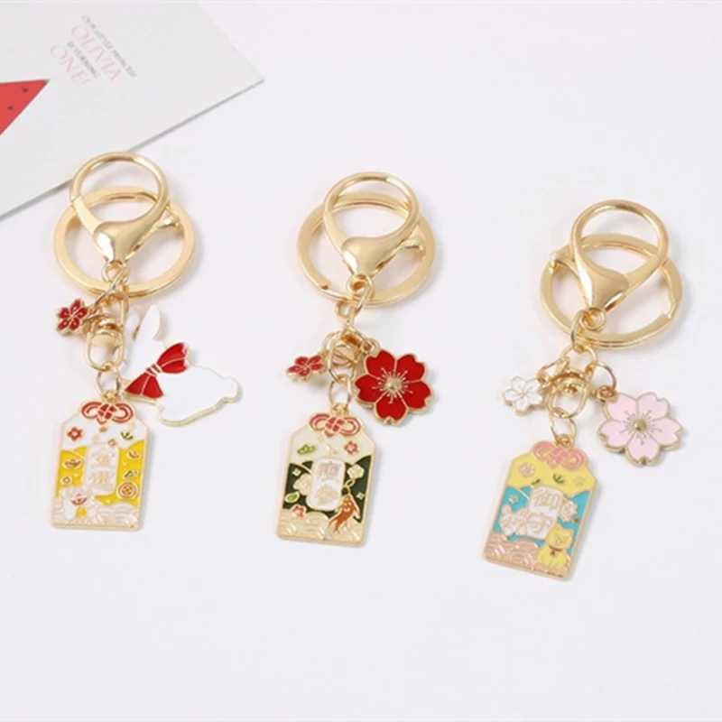 

New Creative Amulet Peach Blossom Yushou Good Luck Keychain Bag Pendant Accessories Couple Pendant Bag Metal Female Jewelry