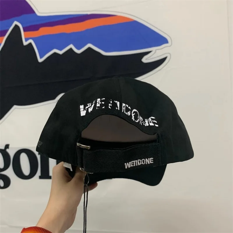 

WELL high version WE11DONE black graffiti baseball cap male Korean version of the same style soft top hat female