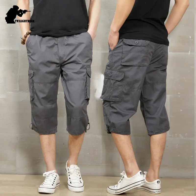 Летние повседневные брюки мужские укороченные оверсайз с несколькими карманами