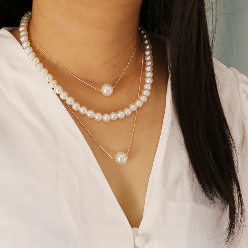 

New multi-layer pearl ladies necklace, metal water wave chain, personality and creative sweet necklace