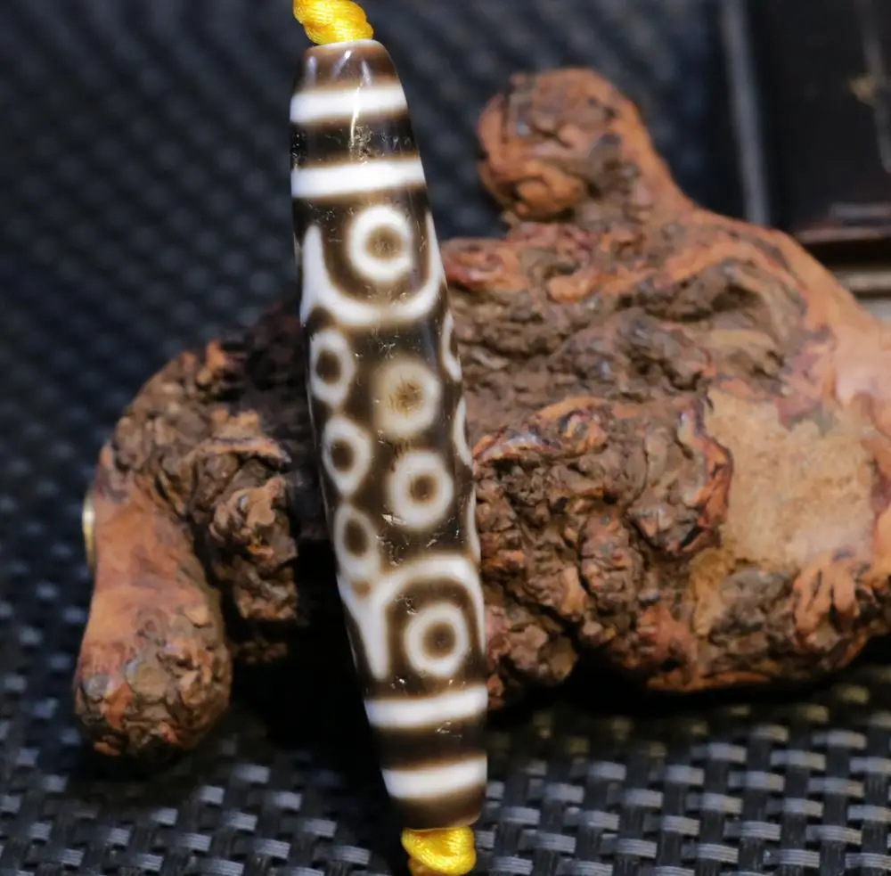 

Волшебное Мощность Тибетский Старый Агат 21 глаз счастливую жизнь символ бусины дзи 76 мм длиной подвеска, амулет FR AJK Timestown