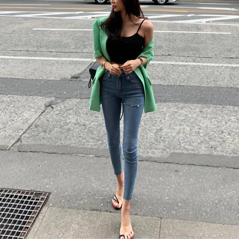 Женские рваные джинсы с высокой талией эластичные узкие бахромой на подоле