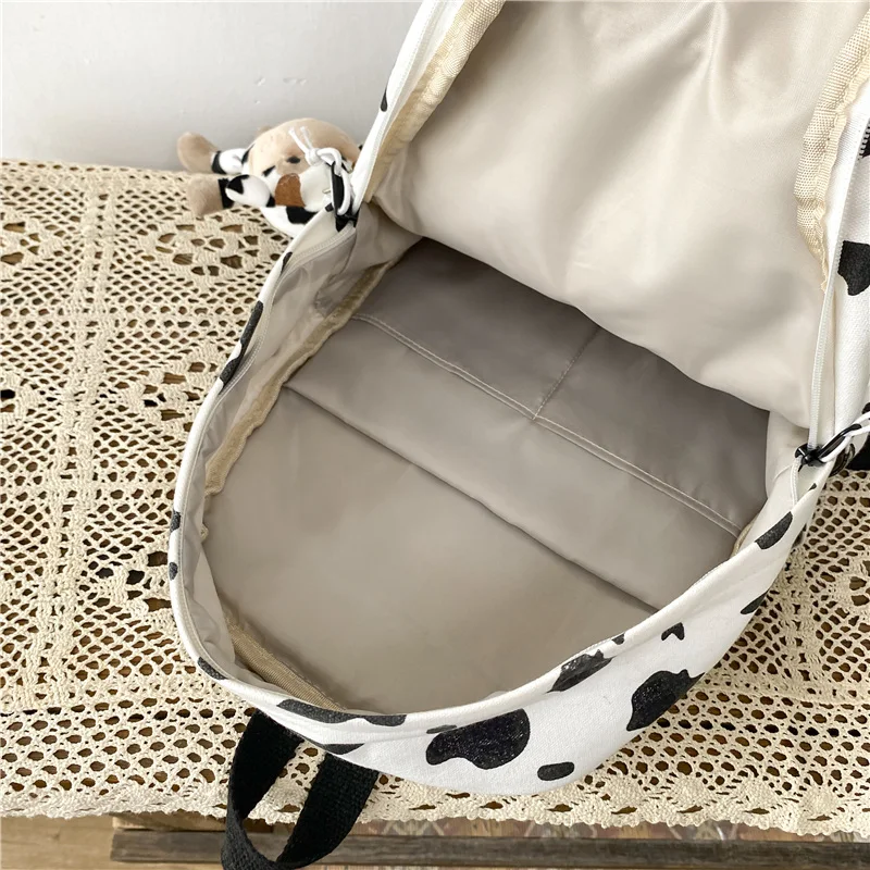 

JOYPESSIE Fashion Cow Print Girl Bagpack Kawaii College School Bag Cute Lady Canvas Travel Mochila Femal Like Backpack Leisure