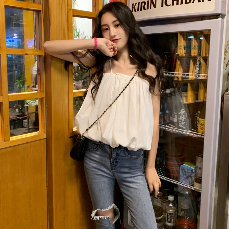 

sweet white loose spaghetti strap off shoulder summer style Korean Backless ladies tops Women's Clothing Trend temperament Camis