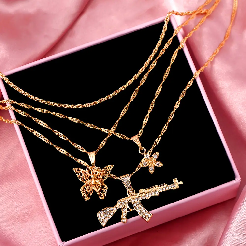 

Personality Crystal Gun Twisted Chain Necklace for Women Multilayer Gold Color Butterfly Flower Pendant Necklace Hip-hop Jewelry