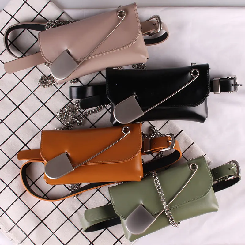 

A new designer has created a big pin belt, a web celebrity chain belt waist, and a cross-body bag to go with your phone