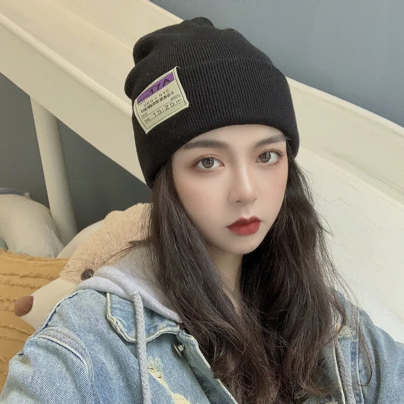 

Fashion ear protection headband hat new wool hat female outdoor knitted hat letter label autumn and winter cold hat