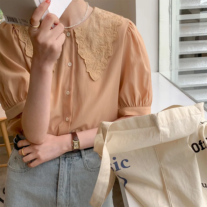 

2021 Summer New Hollow Embroidery Doll Collar Korean Casual Fashion Short-Sleeved Shirt Women Simple Puff Sleeve Shirt q059